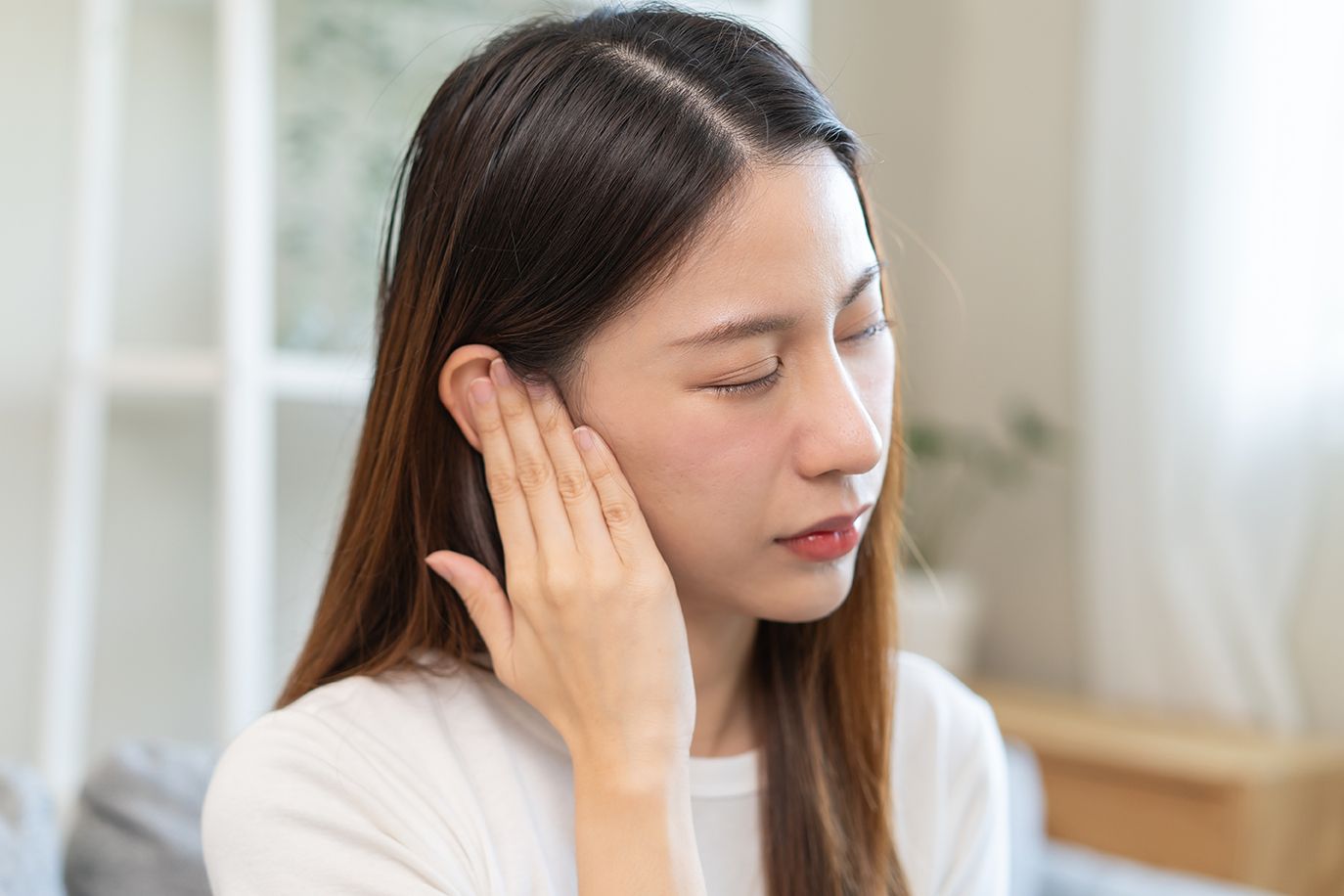 A young woman suffering from tropical climate pathogens